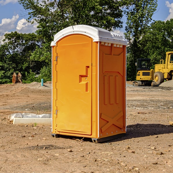 how often are the portable restrooms cleaned and serviced during a rental period in McLean